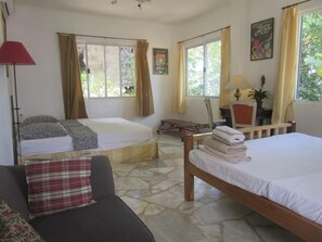 Deluxe fyrbäddsrum (Dolphin) | Individuell inredning, unika möbler och sängkläder