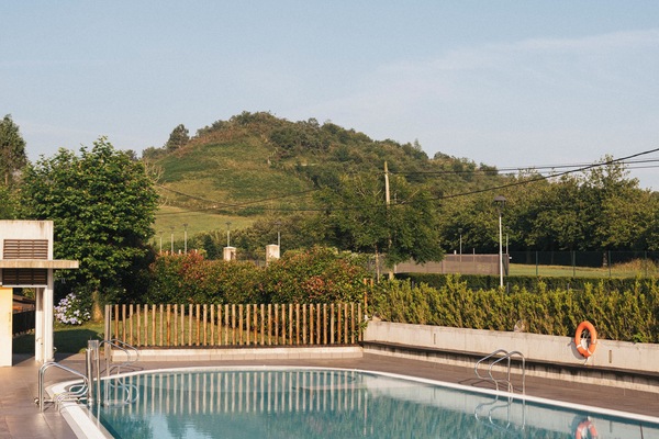 Seasonal outdoor pool, open 10:30 AM to 8:00 PM, pool umbrellas