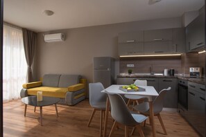 Apartment, 1 Bedroom, Balcony, City View | Living area | 32-inch LCD TV with cable channels, TV - Marina Beach Apartments (Pomorie)