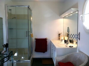 Bathtub, hair dryer, towels, soap