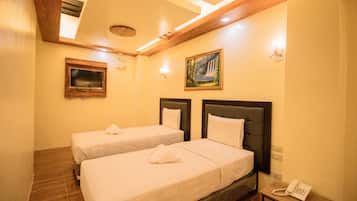 Deluxe Room | Individually decorated, individually furnished, desk, blackout drapes