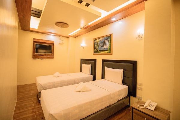 Habitación Deluxe | Escritorio, cortinas opacas, wifi gratis y decoración individual