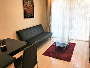 Apartamento | Sala de estar | TV 30 polegadas com canais digitais