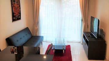 Apartment | Living area | 30-inch TV with digital channels