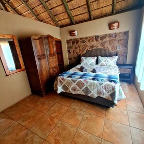 Chalet familiar (Visarend) | Tabla de planchar con plancha y ropa de cama