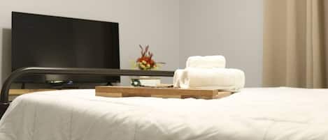 2 bedrooms, blackout curtains, iron/ironing board, travel cot