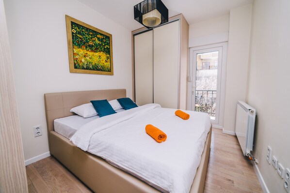 1 bedroom, desk, laptop workspace, iron/ironing board