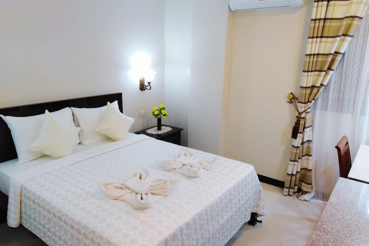 Phòng Suite Deluxe | 1 phòng ngủ, bộ đồ giường cao cấp, minibar, két bảo mật tại phòng