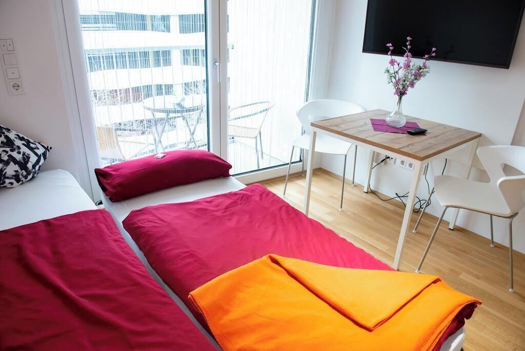 Down duvets, desk, blackout curtains, soundproofing