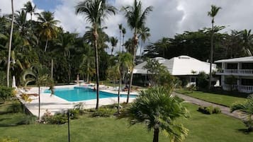 Outdoor pool, open 8:00 AM to 8:00 PM, pool umbrellas, sun loungers