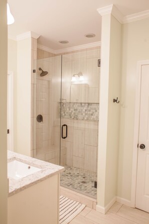 Bathtub, hair dryer, towels, soap