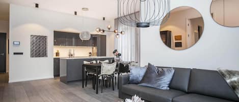 Deluxe Apartment, 2 Bedrooms | Living area | Flat-screen TV