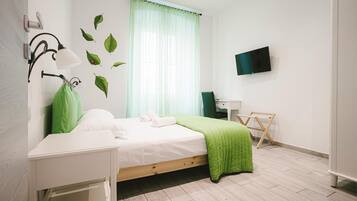 Desk, laptop workspace, blackout drapes, soundproofing