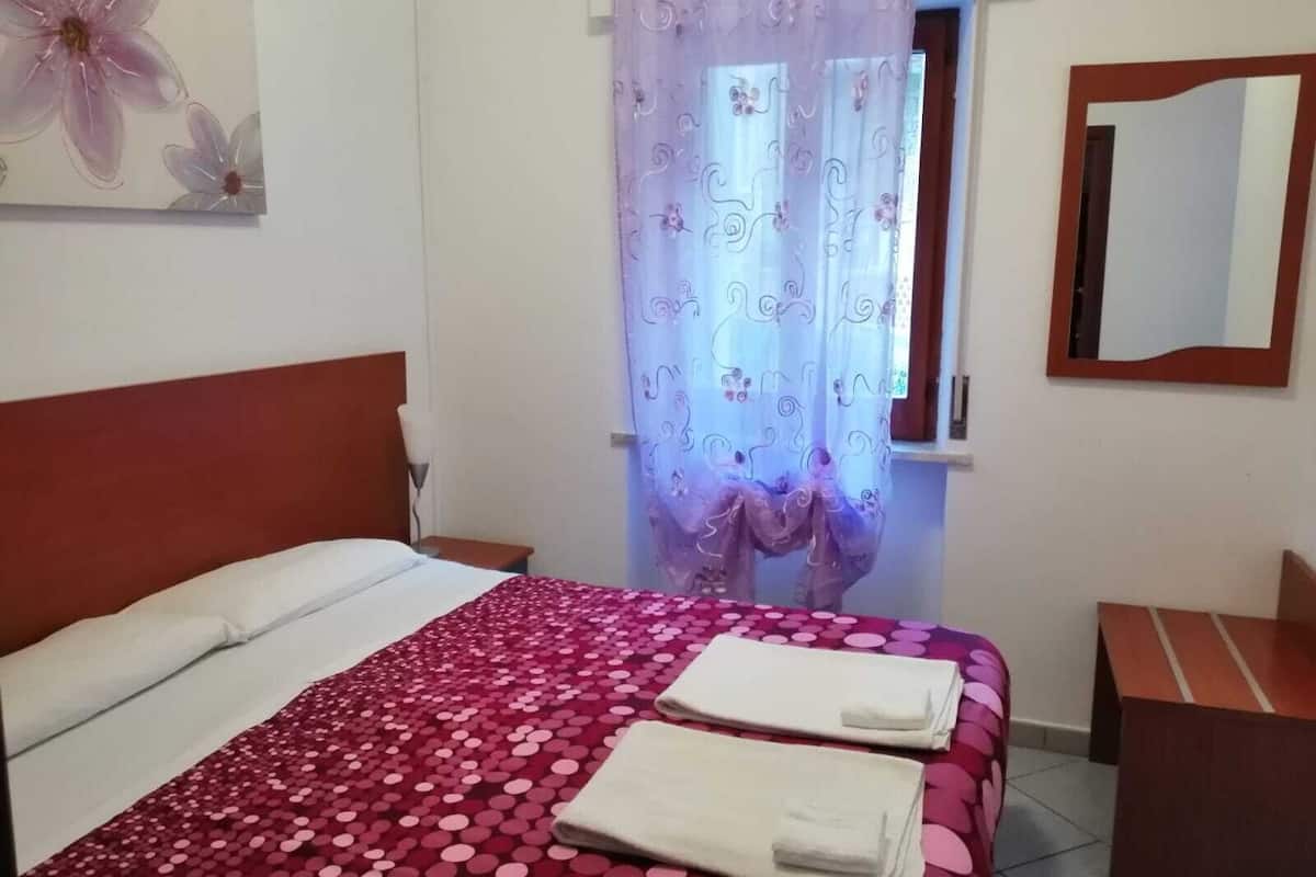 Economy Double Room | Desk, laptop workspace, blackout drapes, iron/ironing board (on request)