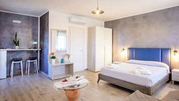 Camera Deluxe | Biancheria da letto ipoallergenica, una cassaforte in camera