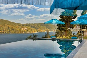 2 outdoor pools, pool umbrellas, sun loungers