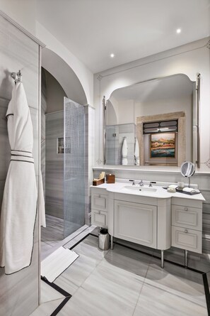 Deluxe Room, 1 King Bed | Bathroom | Separate tub and shower, eco-friendly toiletries, hair dryer, bathrobes