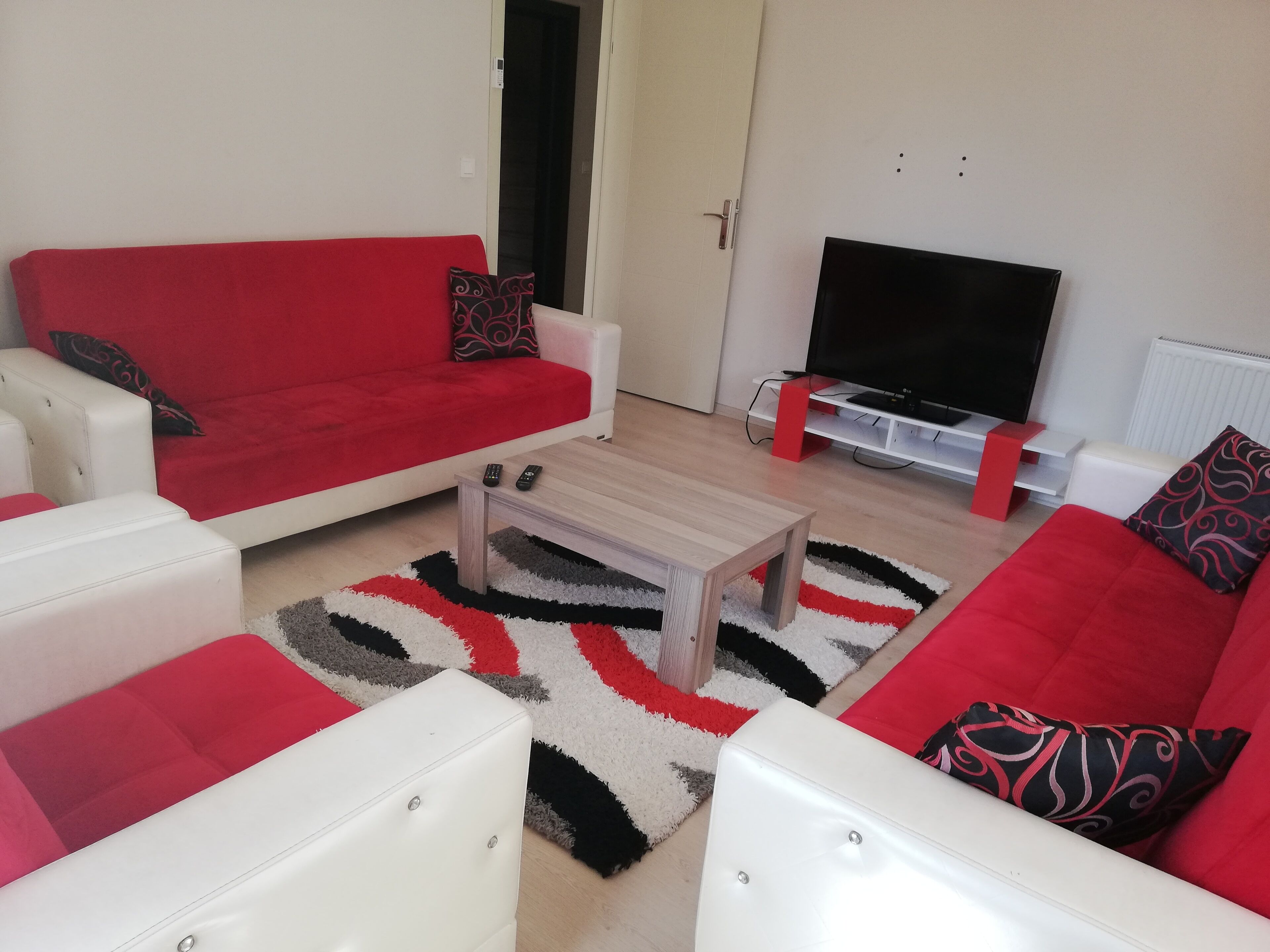 Apartment, 1 Bedroom, Partial Sea View | Living room | 40-inch LCD TV with satellite channels, TV