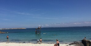 On the beach, sun loungers