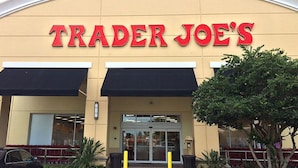 A Trader Joe's store with a beige facade and red signage. - BEACH TIME! WALK/BIKE TO THE BEACH-Min to shops, dining, movies-Fenced backyard (Naples)