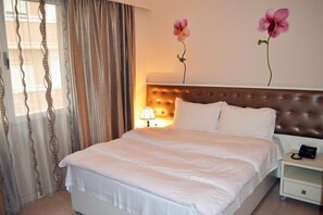 Quarto família | Cofres nos quartos, escrivaninha, Wi-Fi de cortesia, roupa de cama