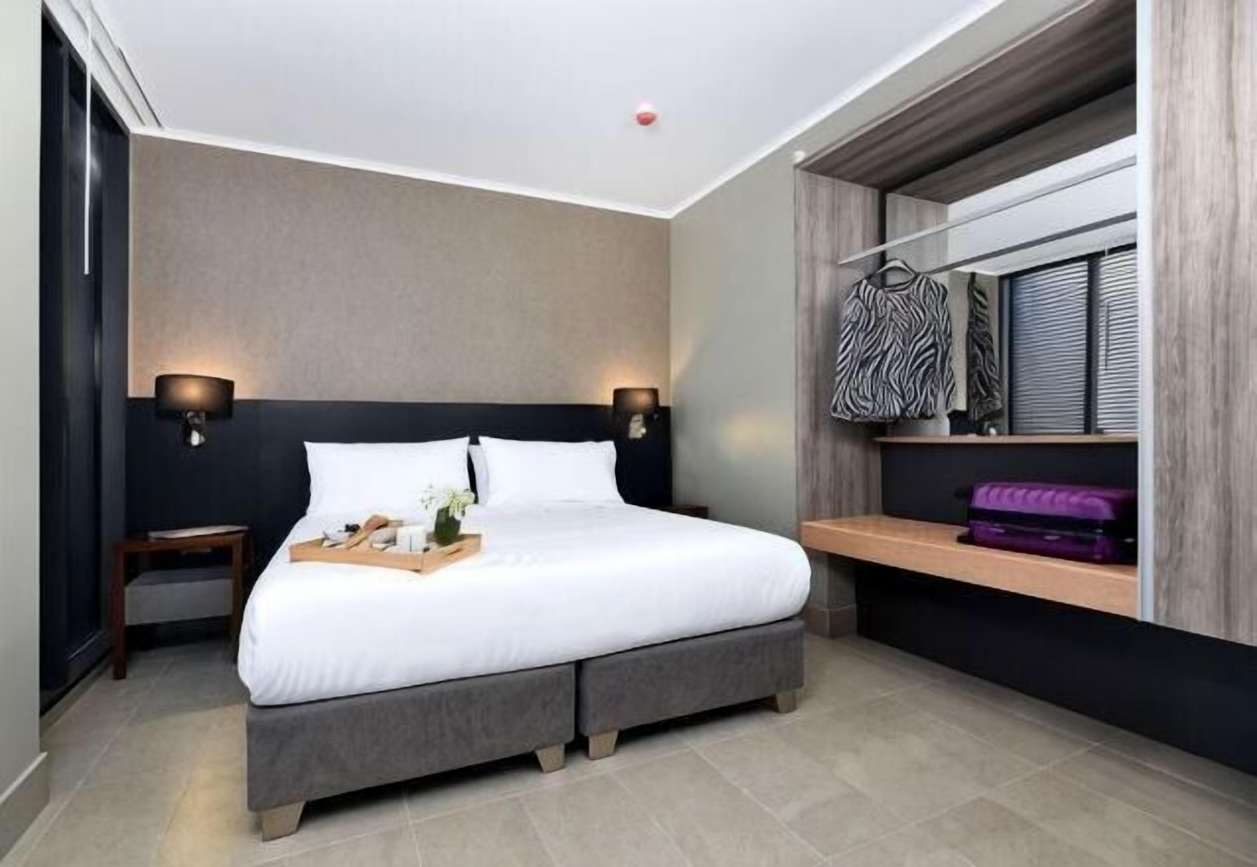 Minibar, laptop workspace, bed sheets