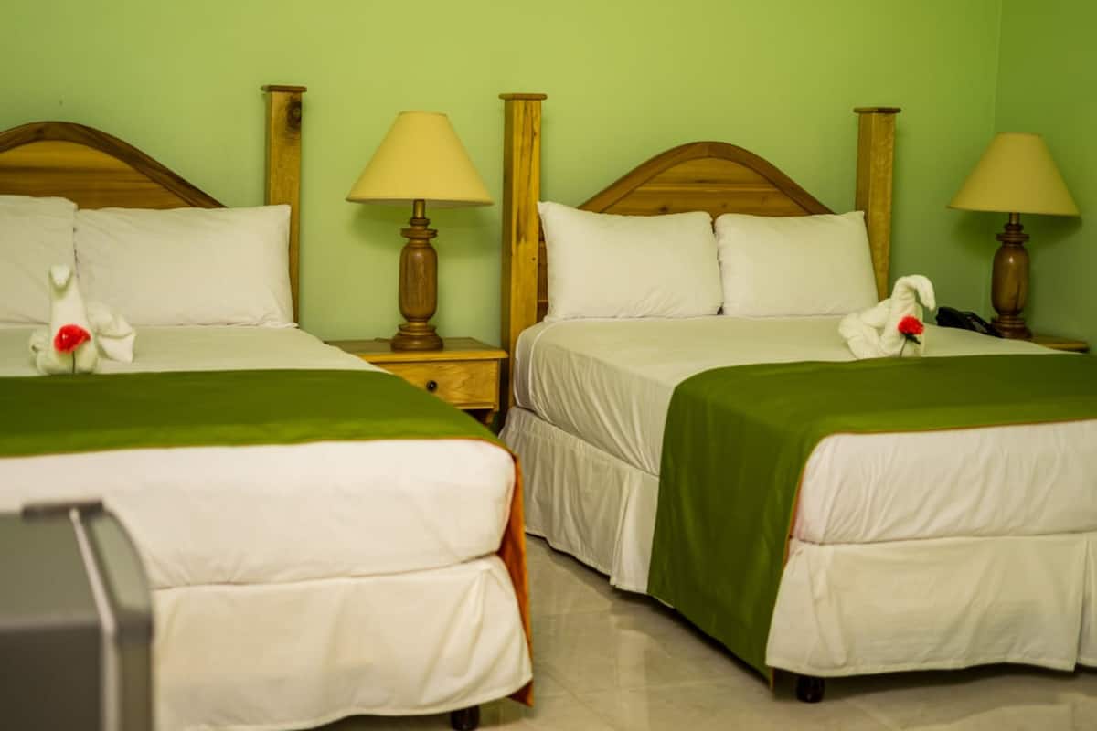 Premium Triple Room, Multiple Beds, Garden View | In-room safe, desk, blackout drapes, soundproofing