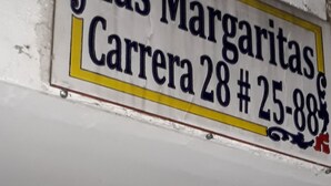 A street sign for "Las Margaritas Carrera 28 # 25-88". - Las Margaritas (Cali)