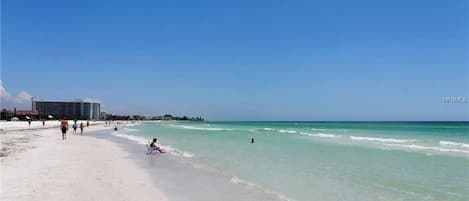 On the beach, sun-loungers