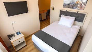 Economy Single Room, 1 Twin Bed | 1 bedroom, minibar, desk, laptop workspace