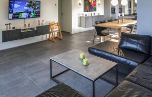 Smart TV, fireplace, table football, ping pong