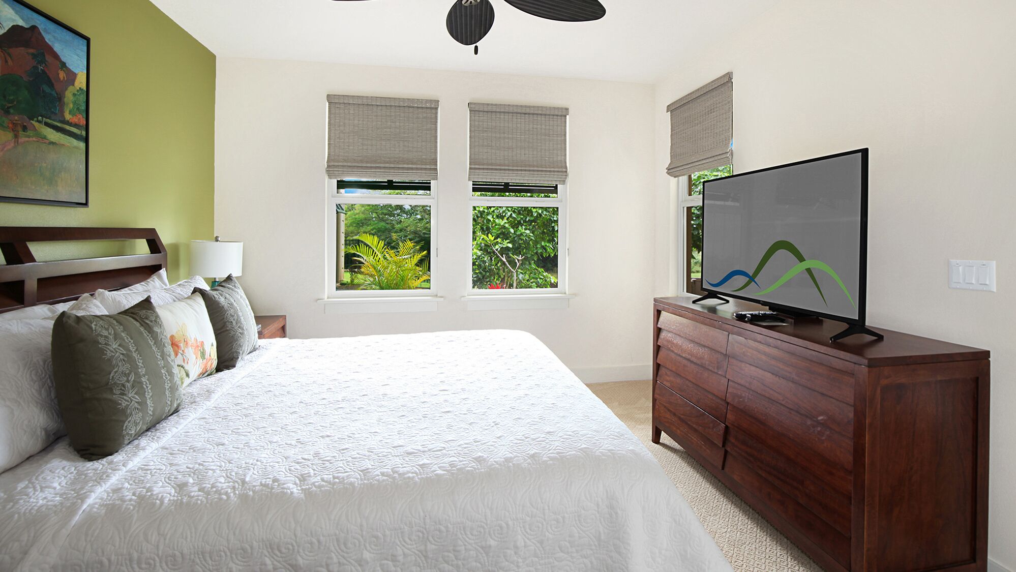 A bedroom with a large bed, a wooden dresser, a flat-screen TV, and two windows with blinds.