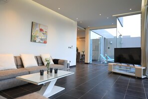 Luxury Chalet, 2 Bedrooms, Private Pool | Living room | LED TV, fireplace - Riyadh Inn (Riyadh)