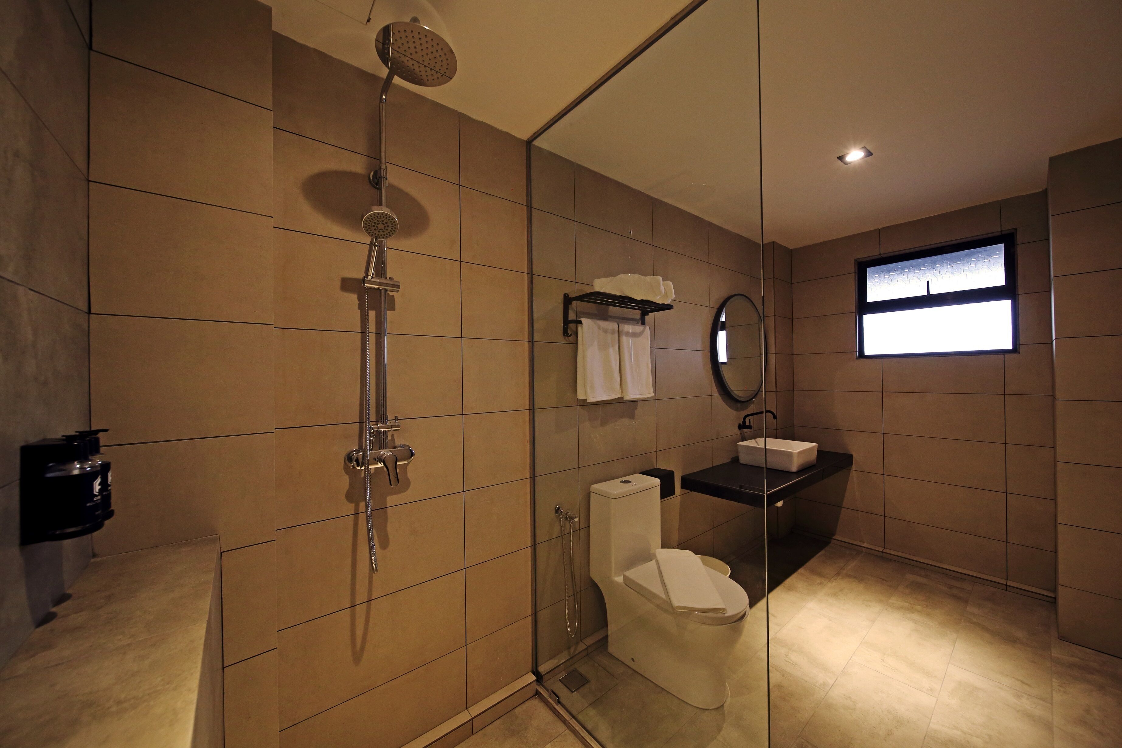 shower, hair dryer, bidet, towels