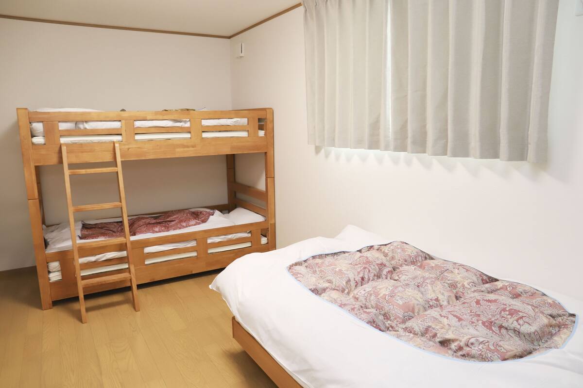 Economy Triple Room | Blackout drapes, WiFi (free), bed sheets