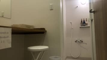 Shower, free toiletries, hair dryer, slippers