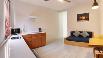 Master Bedroom, 1 Queen Bed | Living room | 32-inch LCD TV with digital channels, TV, Netflix