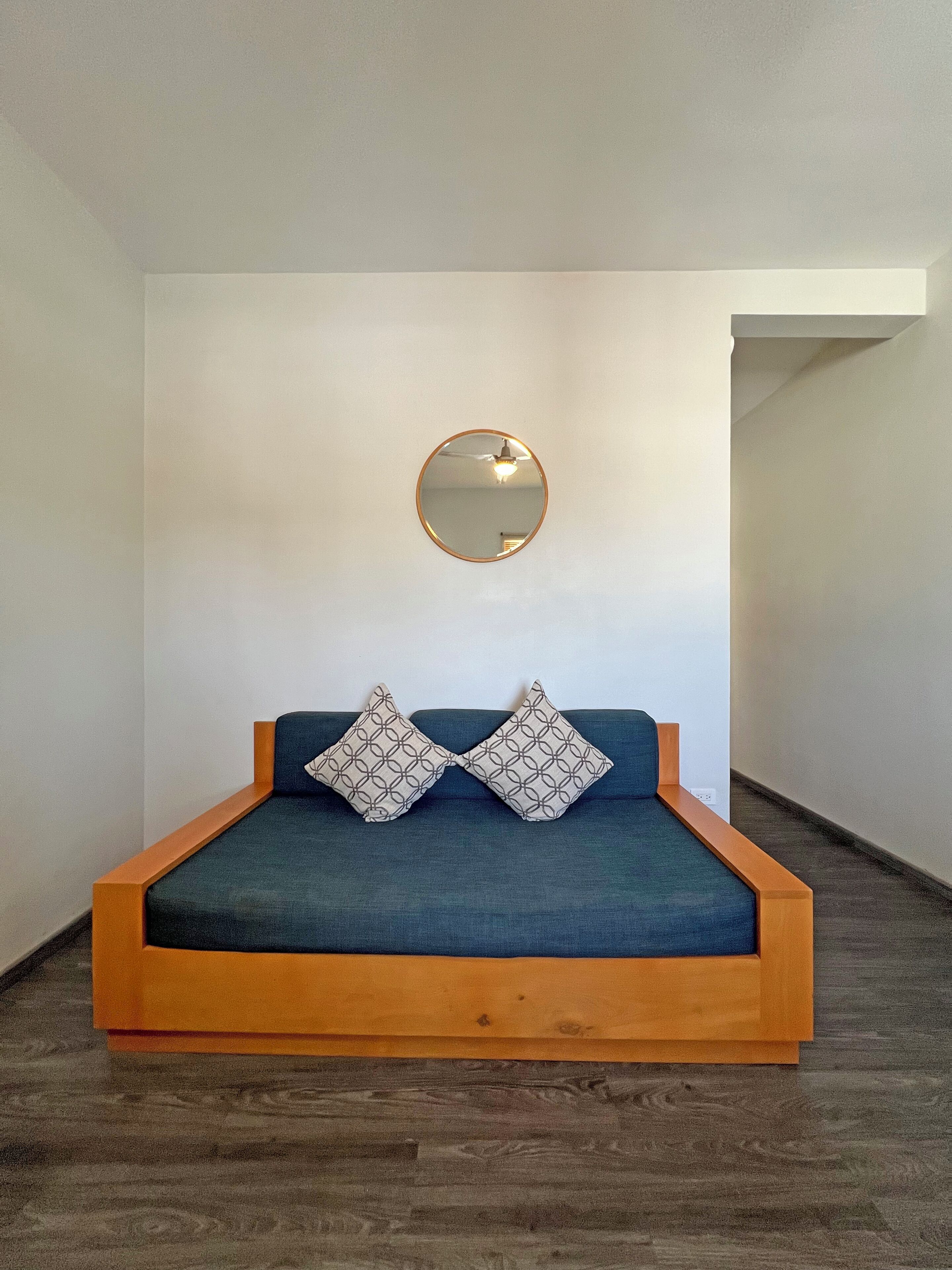 master bedroom, 1 queen bed | living area | 32-inch lcd tv with digital channels, tv, netflix