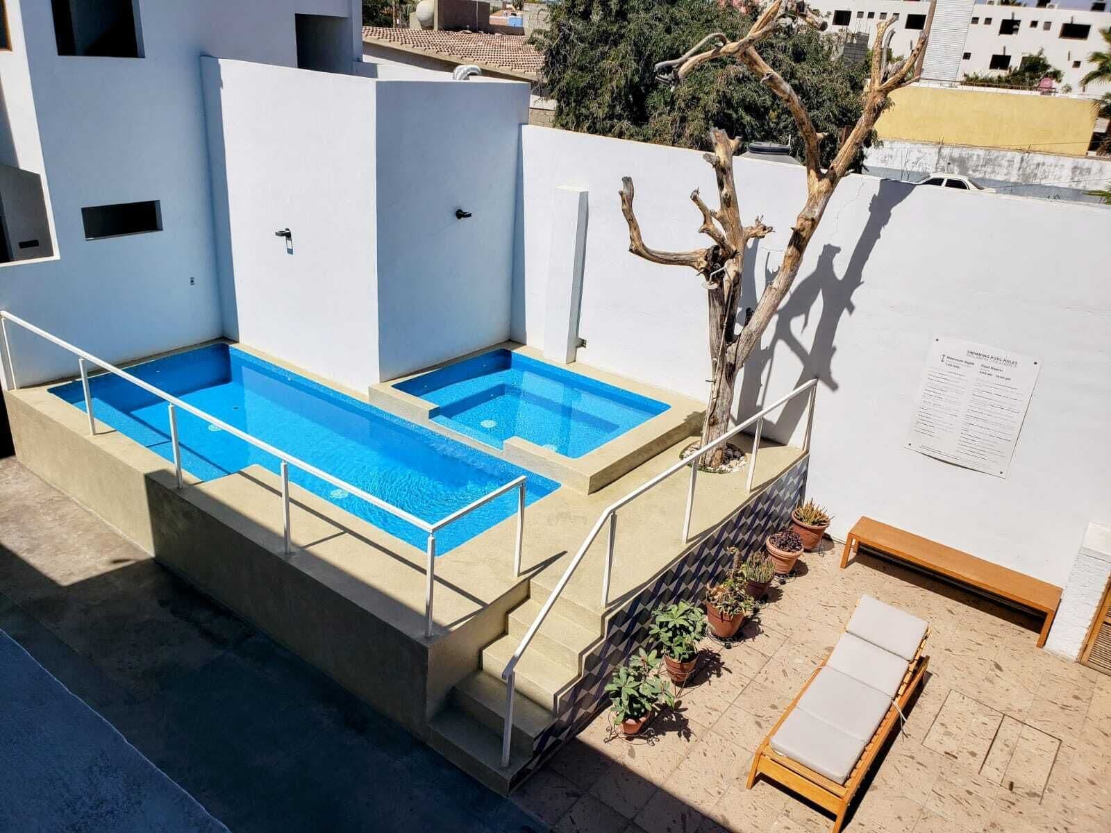 outdoor pool, open 9:00 am to 10:00 pm, pool loungers