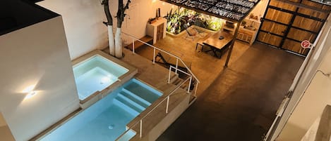 Outdoor pool, open 9:00 AM to 10:00 PM, pool loungers