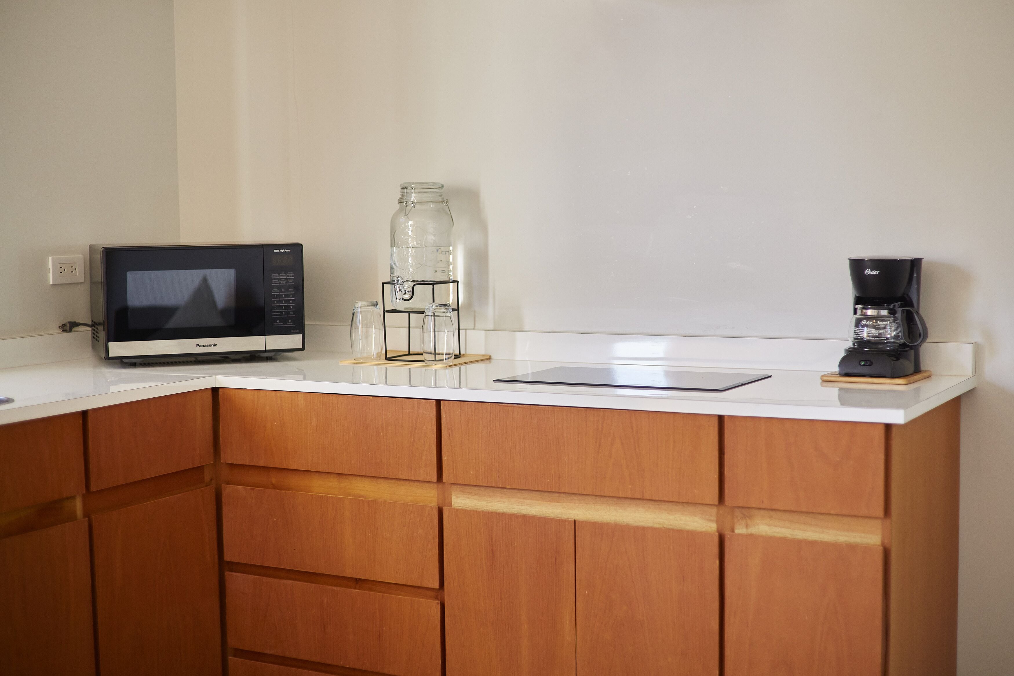 master bedroom, 1 queen bed | private kitchen | mini-fridge, microwave, stovetop, coffee/tea maker