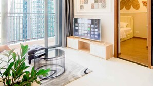 Apartment, 4 Bedrooms, River View | Living area | 50-inch flat-screen TV with cable channels, Smart TV, Netflix