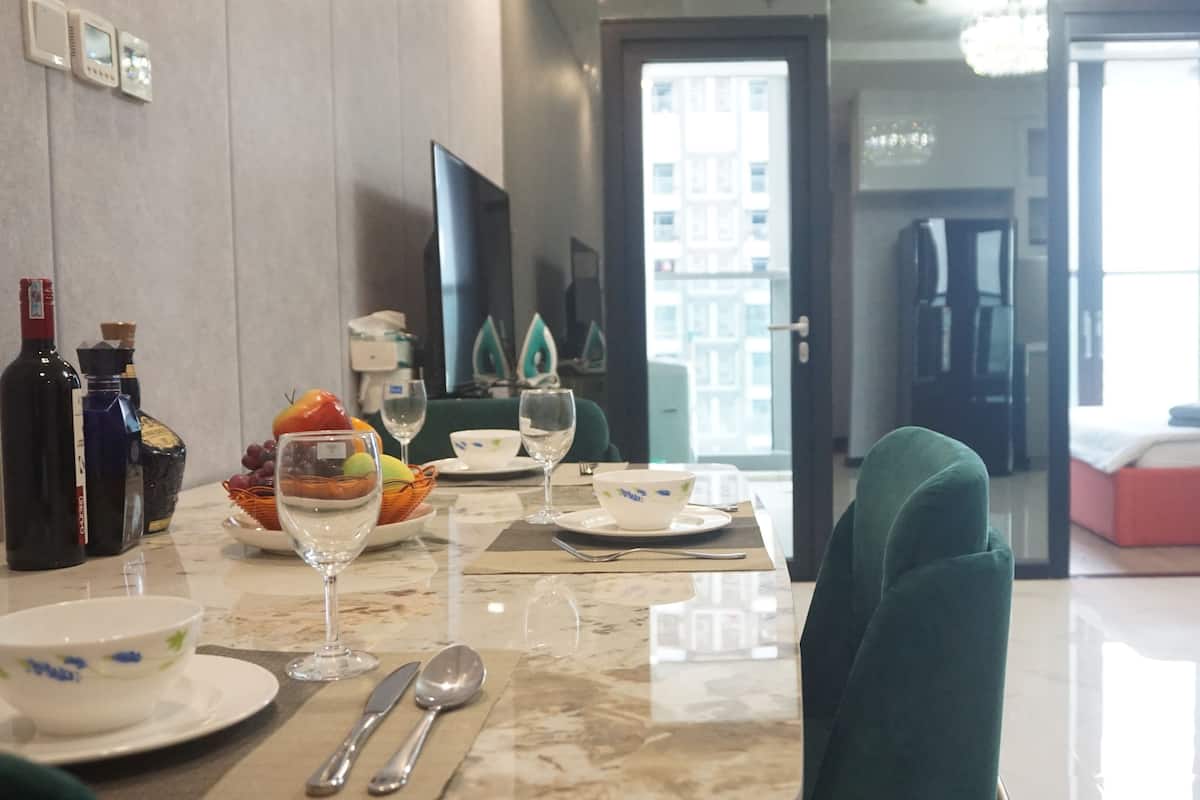 Presidential Condo, 1 Bedroom, River View | Living area | 65-inch flat-screen TV with digital channels, TV, Netflix