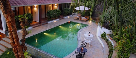 Outdoor pool, open 8:00 AM to 8:00 PM, pool umbrellas, pool loungers