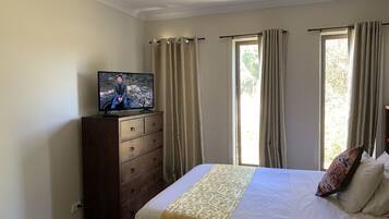 Standard Master Bedroom with Private Bathroom | Individually furnished, iron/ironing board, free WiFi, bed sheets