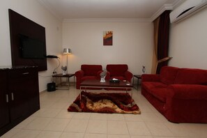 Flat-screen TV - Raoum Inn Serviced Apartments-Majmaa (Al Majmaah)