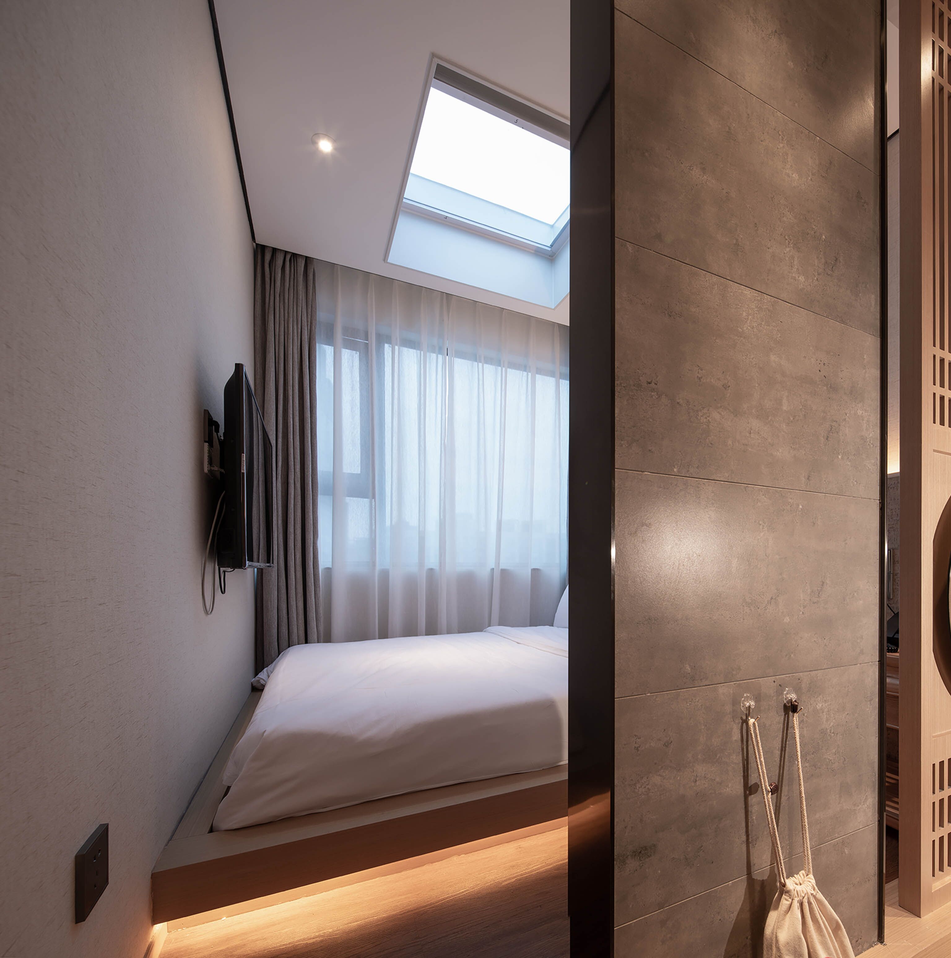 Habitación individual Signature | Escritorio, cortinas opacas, wifi gratis y ropa de cama