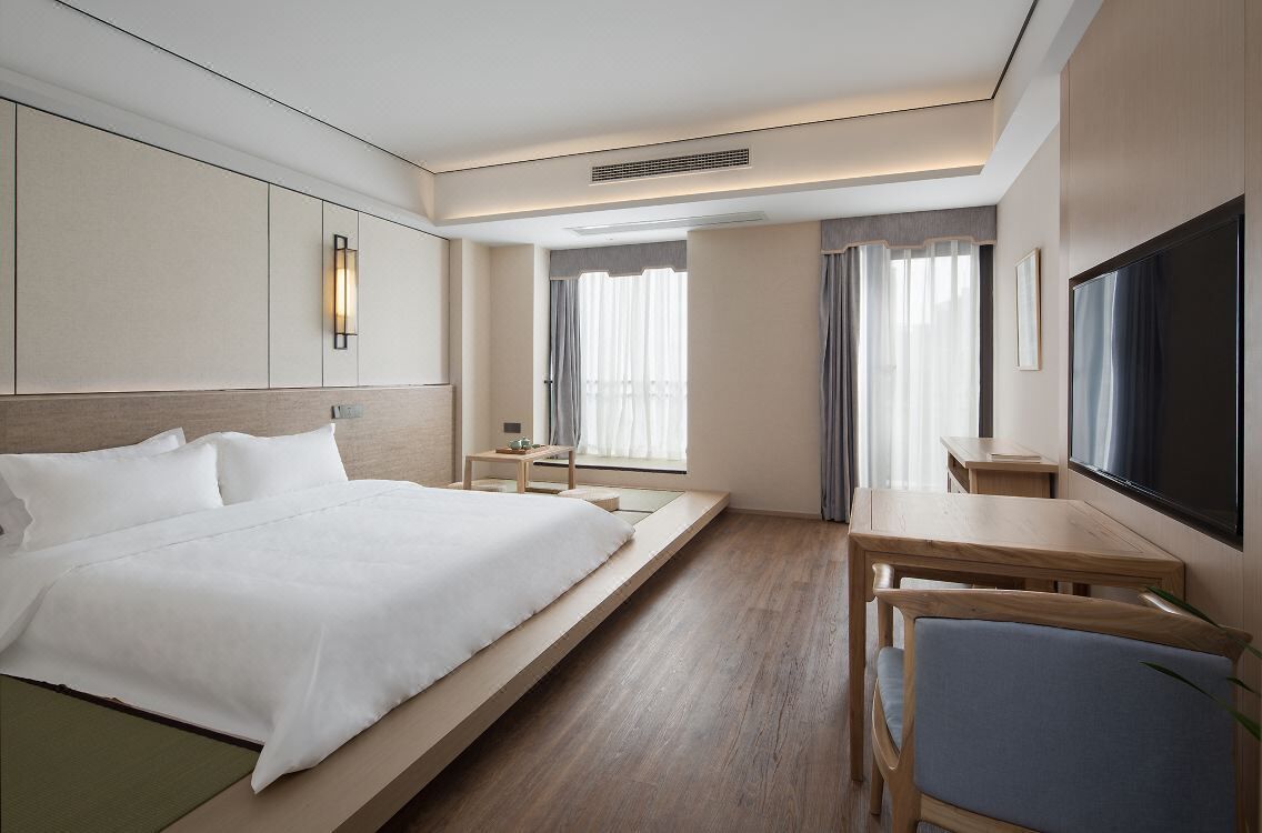 Habitación Elite doble | Escritorio, cortinas opacas, wifi gratis y ropa de cama