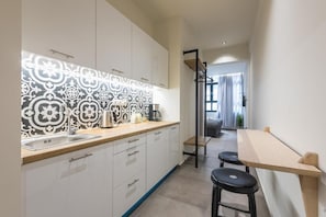 Superior Studio Suite (Andromeda) | Desk, blackout drapes, soundproofing, travel crib - Filia Place (Athens)