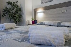 Down duvets, desk, blackout curtains, iron/ironing board